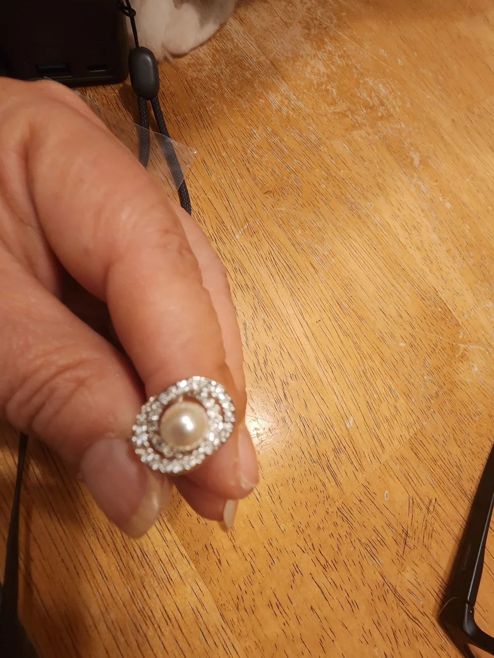 classic Swarovski Crystal Pearl clip ons featuring a central cream faux pearl